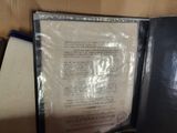 a folder with a piece of paper inside of it
