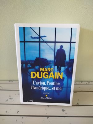 1 livre L'AVION, POUTINE, L'AMERIQUE et MOI - Marc Dugan