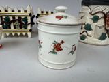 three different types of teapots on the table