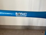 the handlebar of a blue scooter with a logo on it