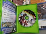 a green case with a game on it in a store