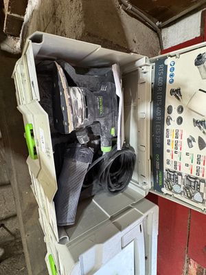 a box with a tie and other items inside of it