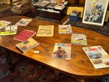 many magazines on the table in the living room