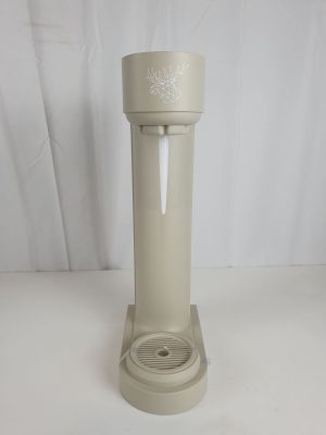 a white water dispenser on a white table
