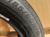 tire tread of a car on a cardboard box with a cardboard box in the background