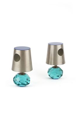 pair of silver and blue glass table lamps on a white background