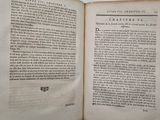 a book open to a page with a picture of a cat