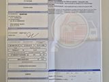 une photo d'un reçu sur laquelle figure la photo d'une voiture