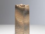 a small vase that is sitting on a table