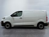 a picture of a white van parked in a garage