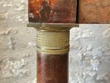 a close up of a piece of wood on a pole