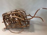 an old fashioned bicycle with a basket on the back