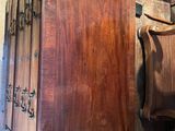 a wooden cabinet that is sitting on top of a table