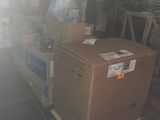 a box sitting on top of a pallet in a warehouse