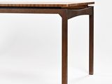 a wooden table with a wooden top and legs