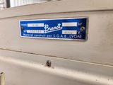 a blue and white sign on the side of a white truck