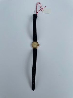 LIP une montre or bracelet cuir 7,8 gr brut