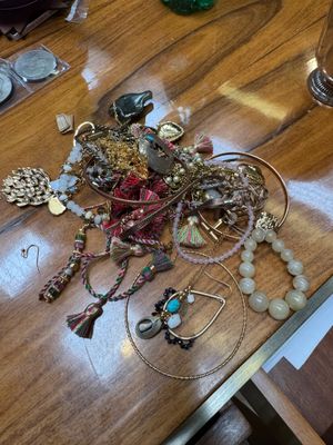 a table with a lot of jewelry on it