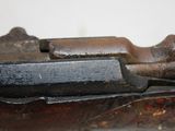 a close up of a gun on a table