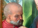 a painting of a man with a goat in his hand