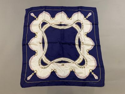 an image of a blue and white square with a gold border