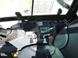 a view from the driver ' s seat of a tractor