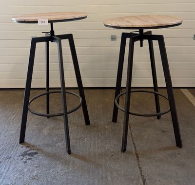 two stools sitting next to each other in a room