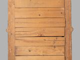 a close up of a piece of wood with wooden slats on it