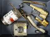 a box filled with various tools and items that are in it