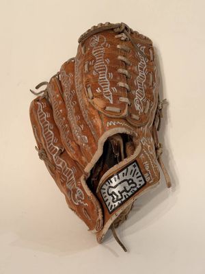 a baseball glove that is sitting on a table
