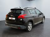 a picture of a black car parked in a showroom