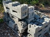 concrete blocks stacked on top of each other in a pile