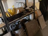 a room with a lot of stuff on the shelves