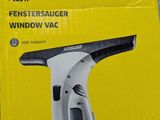 a box with a black and white hair dryer inside of it