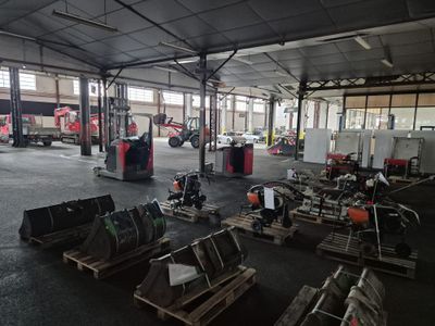 a large warehouse with a lot of equipment in it