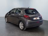 a grey car that is parked in a room