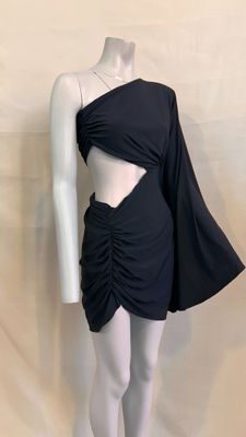 the mannequin is wearing a black dress with a cut out top