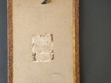 a close up of a picture of a piece of paper with a bird on it