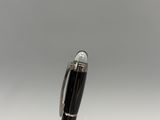 an image of a pen that is sitting on top of a table