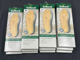 four packs of foot care products on a black surface