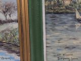 two paintings on the wall next to each other