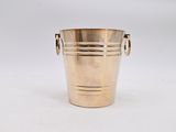 an image of a brass ice bucket with handles on a white background
