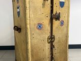 an old suitcase sitting on the floor in a room