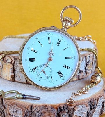 a clock that is sitting on top of a tree stump