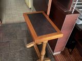 a small table in the middle of a kitchen