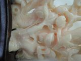 a close up of a carved elephant on a plate