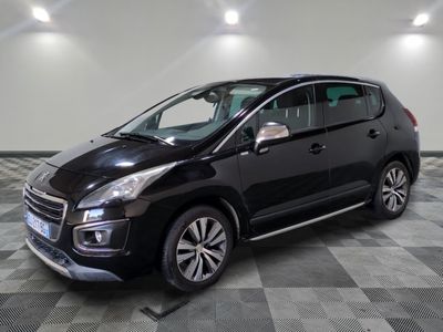 a picture of a black car parked in a garage