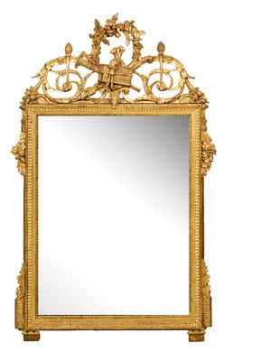 une image d'un miroir avec un cadre doré sur un fond blanc