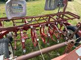 une image représentant un tracteur équipé d'une charrue