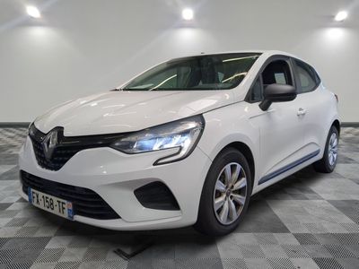 the white car is parked on a checkered floor in the garage